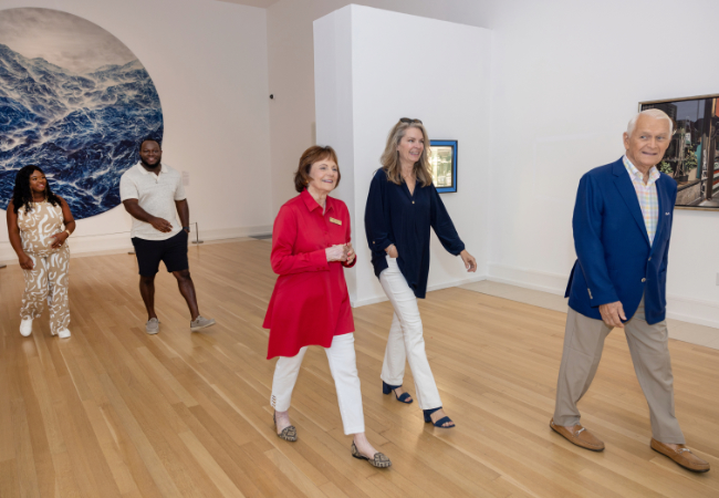 People walking through Vera Beach Museum of Art